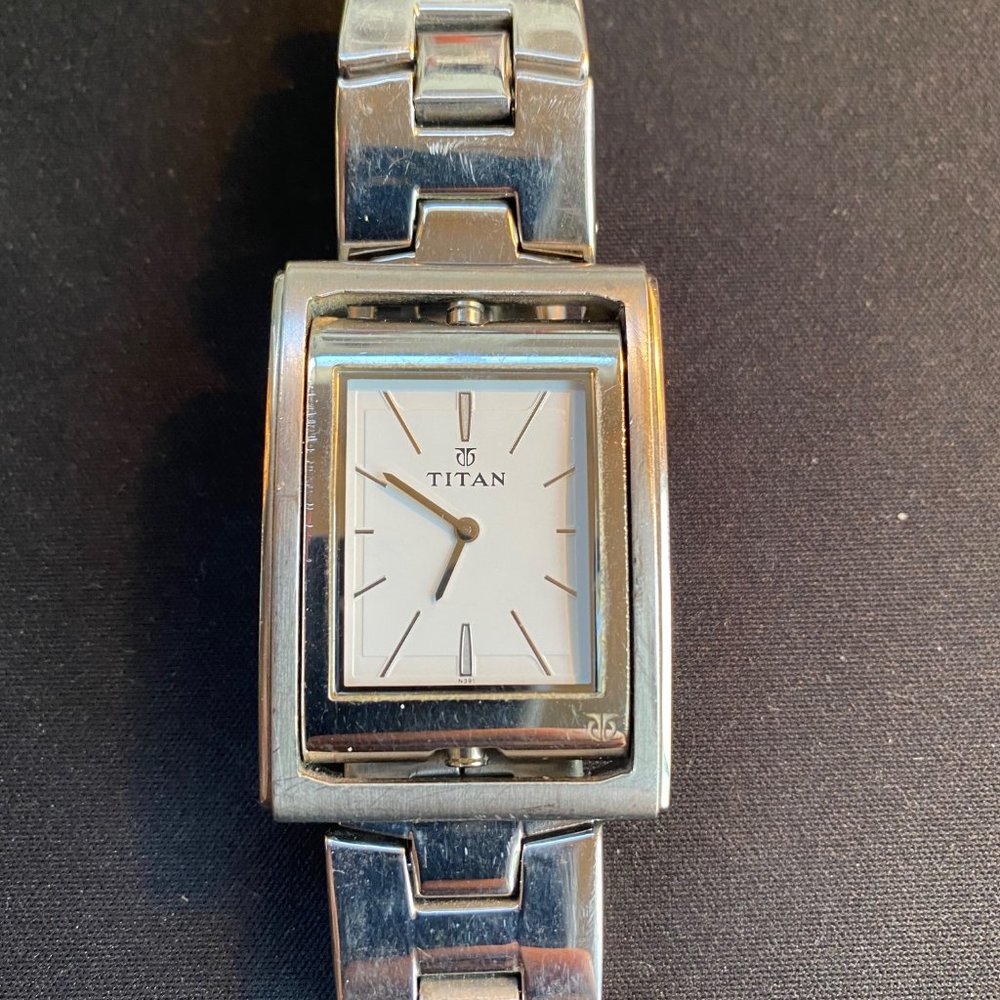 TITAN reversable face watch in need of repair
